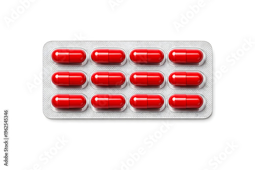 Blister pack of red capsules on a white background, pharmaceutical packaging
