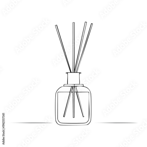 Aromatic diffuser with reeds in a glass bottle for home fragrance and interior decor