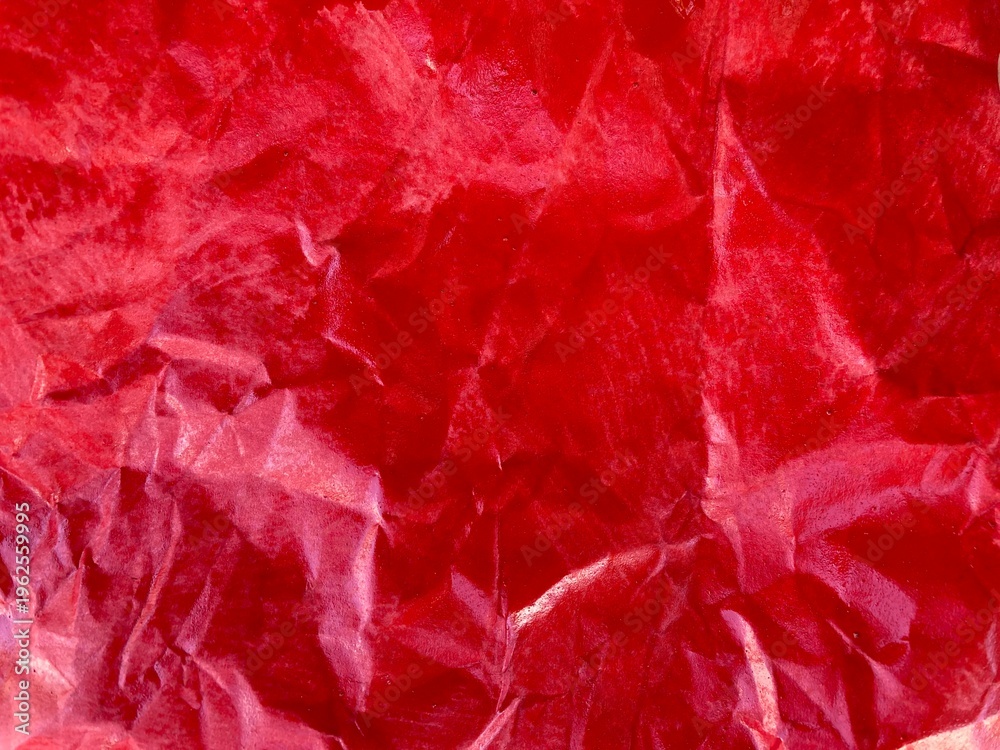 Obraz premium Red crumpled paper. Texture of wrinkled paper, grunge texture. Creased crumpled paper overlay effect, png wrinkled paper surface