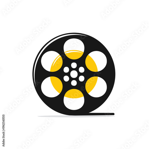 Vintage film reel with yellow accents and white dots symbolizing a movie production concept