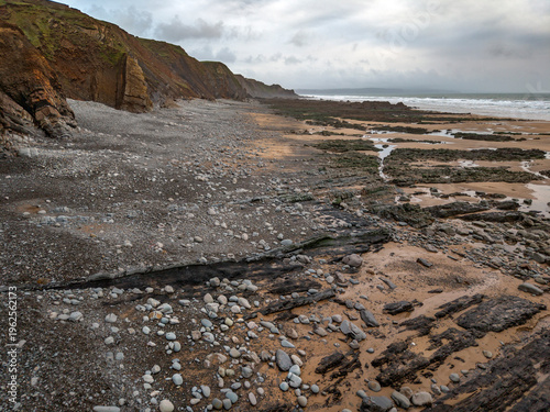 Deserted Cornish beach shaped by the Atlantic sea