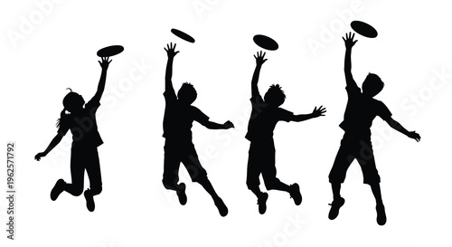 Children playing frisbee outdoors captured in a striking silhouette