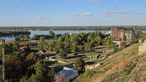 Beautiful view of a city with a river in the background. The buildings are tall and the sky is clear in Belgrade