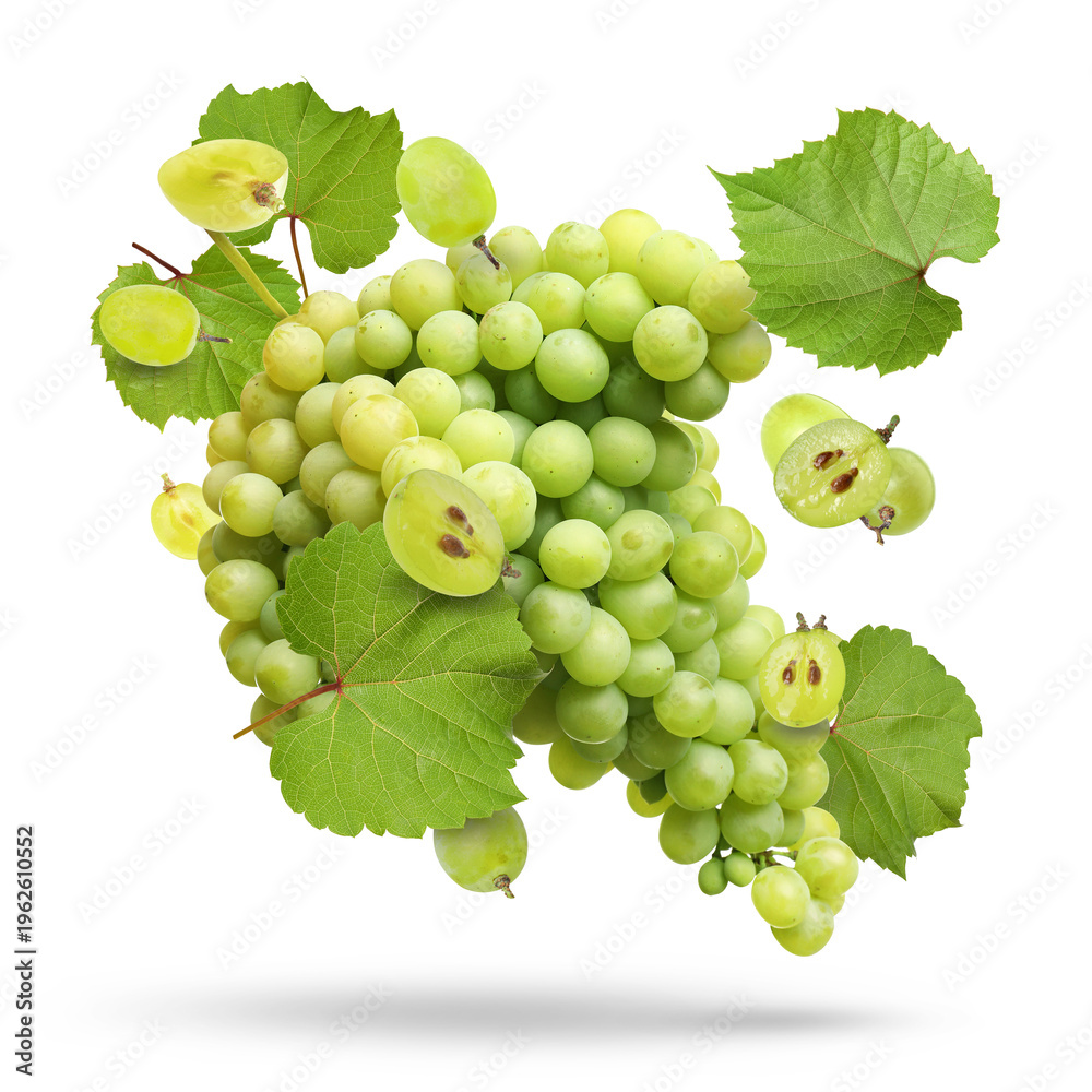 Obraz premium Fresh juicy grapes and green leaves falling against white background