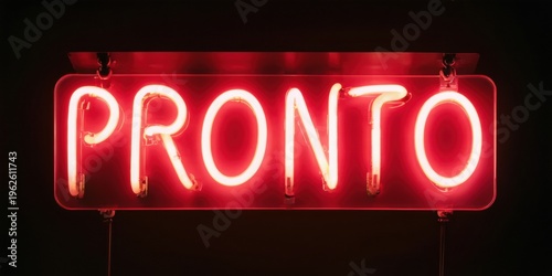 Bright red neon sign displays PRONTO. Rectangular shape hangs suspended against dark background. Simple, bold lettering.