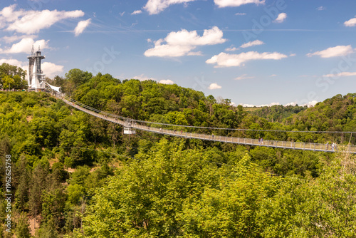 Bild auf Leinwand BODE, GERMANY - JUNE 28, 2022: Tourists at suspension bridge Titan RT at Rappbod