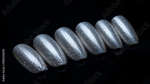 Shiny silver nail construction on black