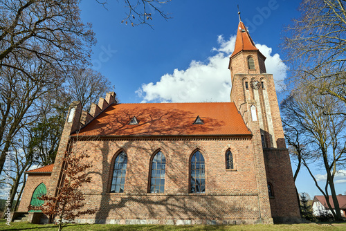 Historic, neo-Gothic church with a bell tower in Warcislaw