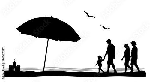 Silhouette of family walking on beach with umbrella and castle