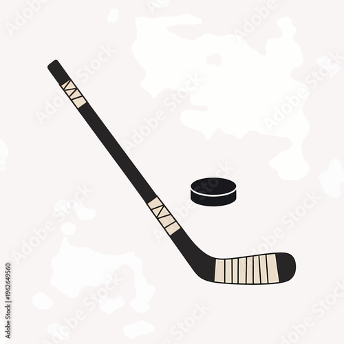 Hockey stick and puck on the ice surface. The equipment is ready for the exciting game!