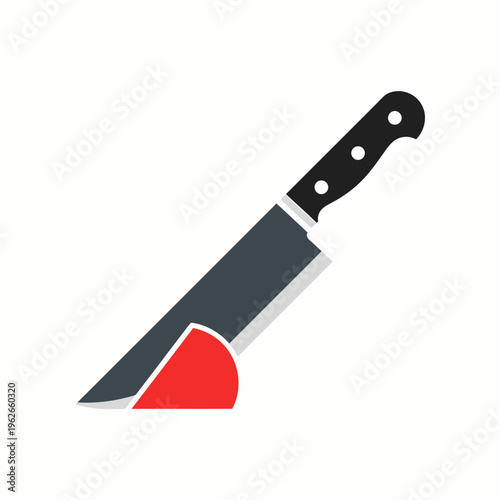 A sharp knife placed in a red stand with a black handle. The blade is clearly visible