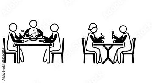 People dining together at a restaurant table enjoying meals in a black and white scene.
