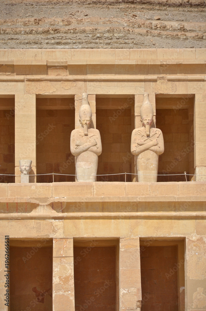 Fototapeta premium Osirian column in the mortuary temple of Hatshepsut located opposite the city of Luxor, Egypt