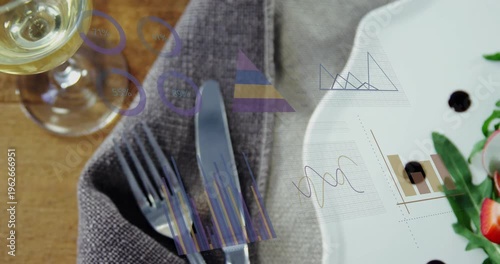 Camera panning right revealing restaurant plate with salad while animated graphics promoting dish