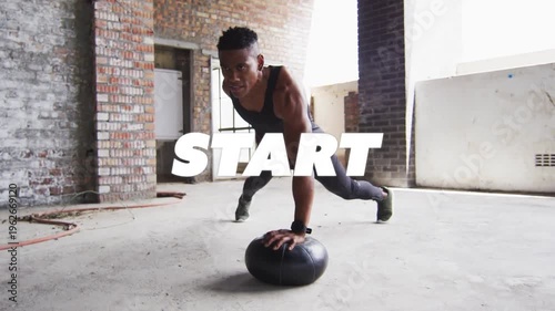 Animated START graphic revealing man holding plank on medball, stabilizing for next fitness rep