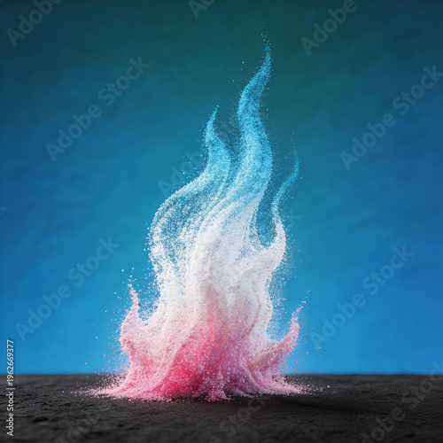 Abstract artistic display of colorful powder explosion with blue, pink, white hues, dynamic particles, and fluid motion against a dark surface and blue background.