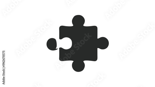 A single, dark gray jigsaw puzzle piece with a white background. It's a simple, graphic image
