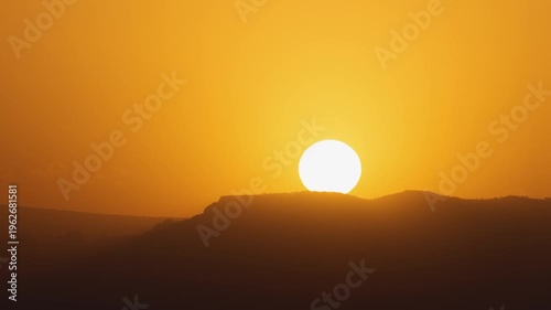 Sunset over Mysterious Desert Landscape Zoom Out Timelapse