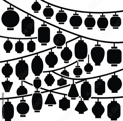 Silhouette of traditional japanese paper lanterns hanging on strings for festive asian celebration backdrop.