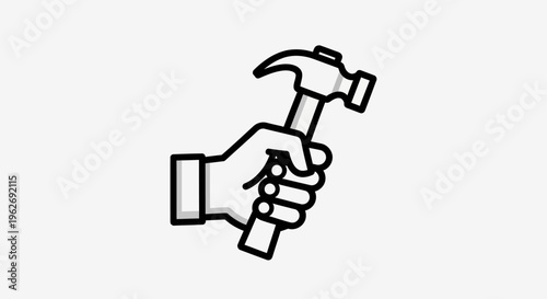 Hand holding a hammer tightly.