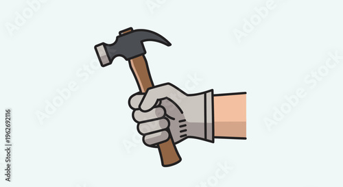 Hand holding a hammer tool.