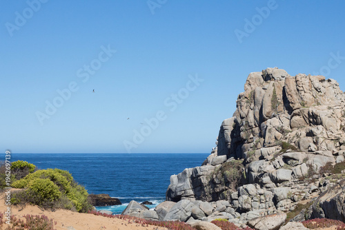 Granite rock formation and Pacific Ocean view at Piedra del Trueno peninsula, Punta de Tralca Chile