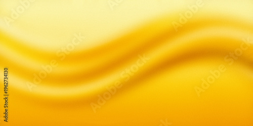 Tableau sur toile A vibrant yellow abstract background with smooth wavy lines and gradient texture