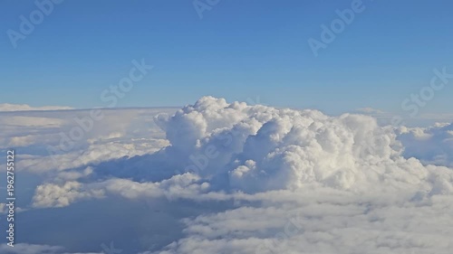Wallpaper Mural The sky is blue and the clouds are white. The clouds are fluffy and the sky is clear Torontodigital.ca