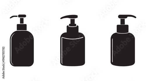 Three black bottles with pump dispensers on white background for cosmetics or soap products