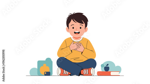 Happy young boy sitting cross-legged on the floor with school supplies and looking forward with joy on white background.