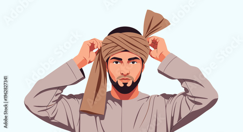 Man in traditional attire tying a turban on his head.