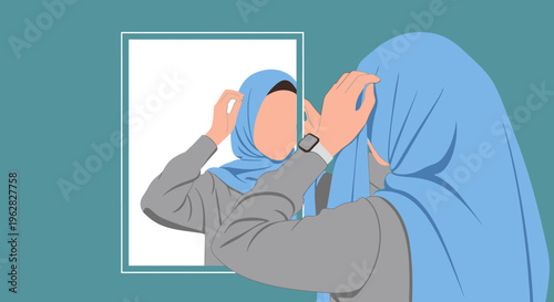 Muslim woman adjusting her hijab in front of a mirror.