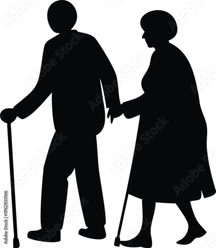 Silhouette of an elderly couple walking together holding hands