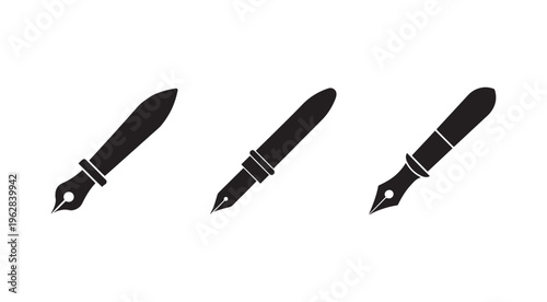 Three black fountain pen nibs with handles on white background  writing instruments