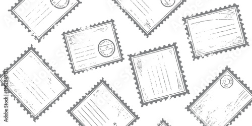 Scattered vintage postage stamps with perforated edges and textured surfaces on a white background retro