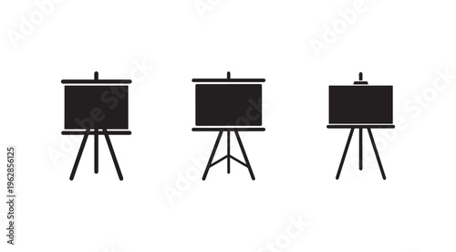 Three blackboards on easels in different angles for presentation or education purposes in a classroom setting with white background  various teaching tools