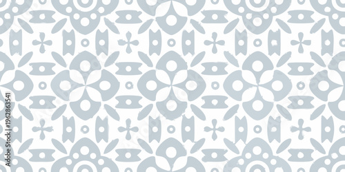 Light blue geometric pattern featuring symmetrical floral and teardrop shapes