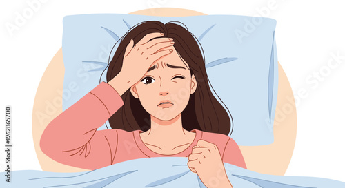 Ill young woman lying in bed with a severe headache or fever covers her forehead with her hand and looks distressed and exhausted.