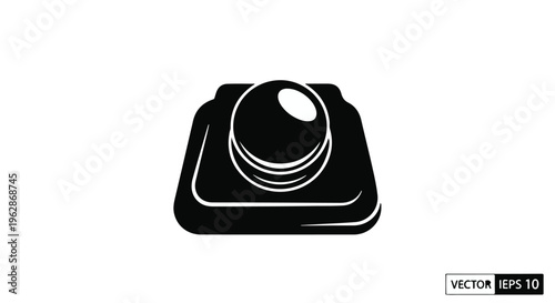A simple, glossy black icon depicts a single round button or switch mechanism resting upon a squared base, suggesting activation or control input.