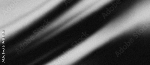 Abstract Black and White Grainy Gradient Background with Soft Diagonal Light Streaks