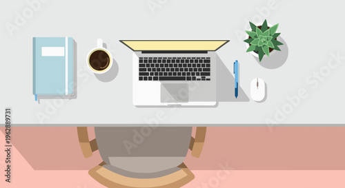 Laptop on a desk top view.