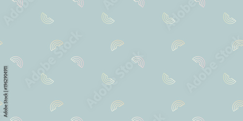 Minimal seamless pattern of small half rainbow shapes scattered across a soft blue background.