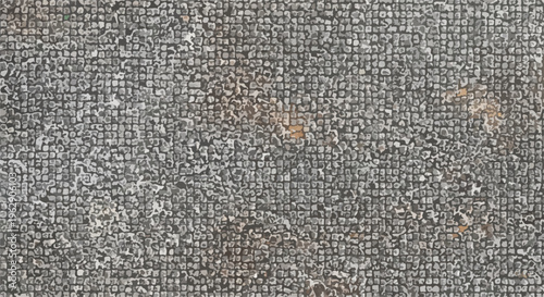 A grayscale mosaic of tiny, irregular stones or tiles, like a cobbled surface