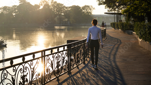 Life lifestyle thai people and fitness enthusiast training jogging and walk run exercise workout in Somdet Phra Srinagarindra Park or Suan Somdet Ya Public Garden at Pak Kret in Nonthaburi, Thailand