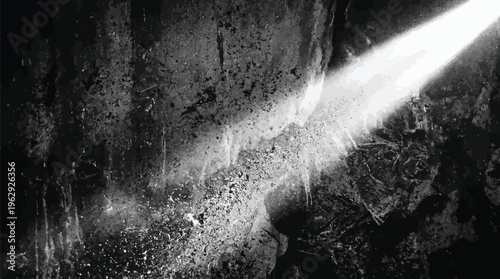 A beam of light shines through a dark and grungy concrete wall with cracks and stains