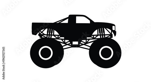 Silhouette of a powerful monster truck with oversized tires and chassis