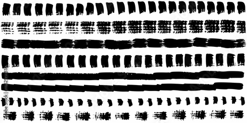 Collection of abstract black brush strokes on a white background