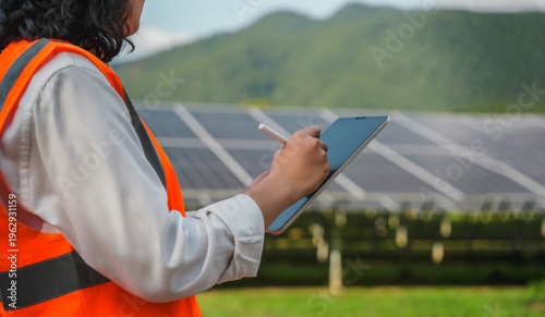 Foto Sustainable renewable energy, solar panels and wind turbines, green infrastructure, Sustainable Development Goals