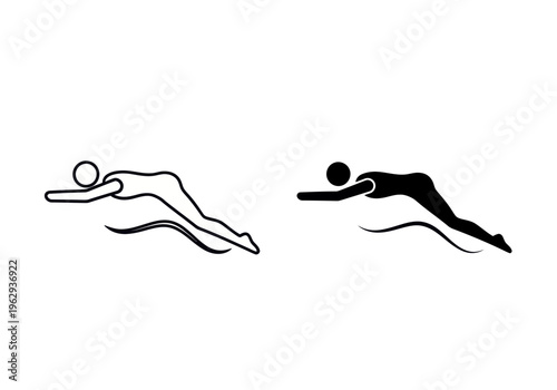 Two swimmers dive into the water in a synchronized swimming event at the pool with ripples and waves.