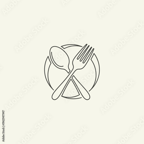 Spoon and fork on plate.